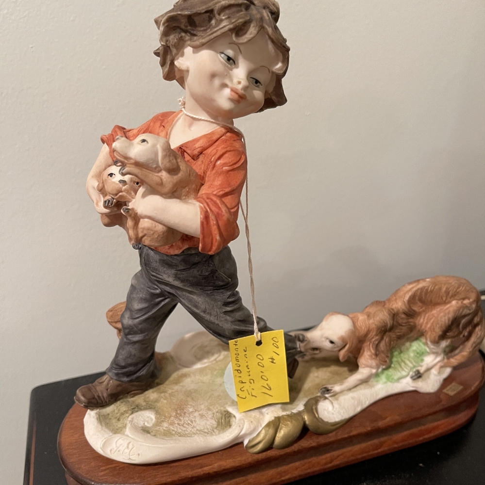 Charming Boy with Puppies Figurine